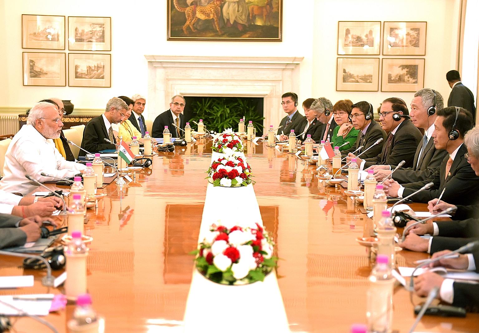Mr Modi (far left) and PM Lee at a meeting in Hyderabad House yesterday. Mr Lee credited India's transformation and optimism about its prospects to Mr Modi's leadership and vision, while the Indian PM called Singapore a key partner on India's journey