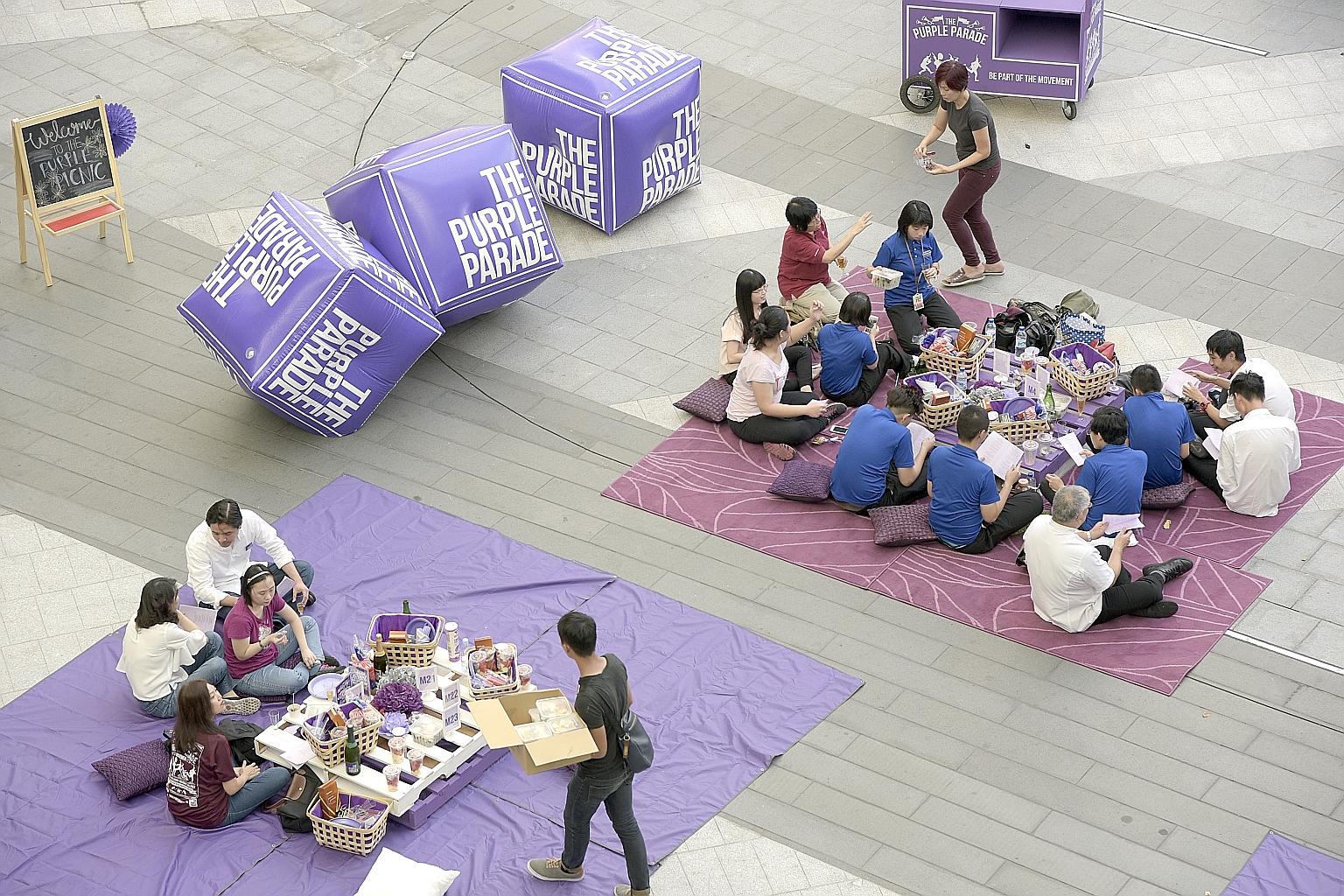 Highlights of the Nov 5 Purple Parade were announced yesterday at a picnic at Suntec City attended by more than 200 people.