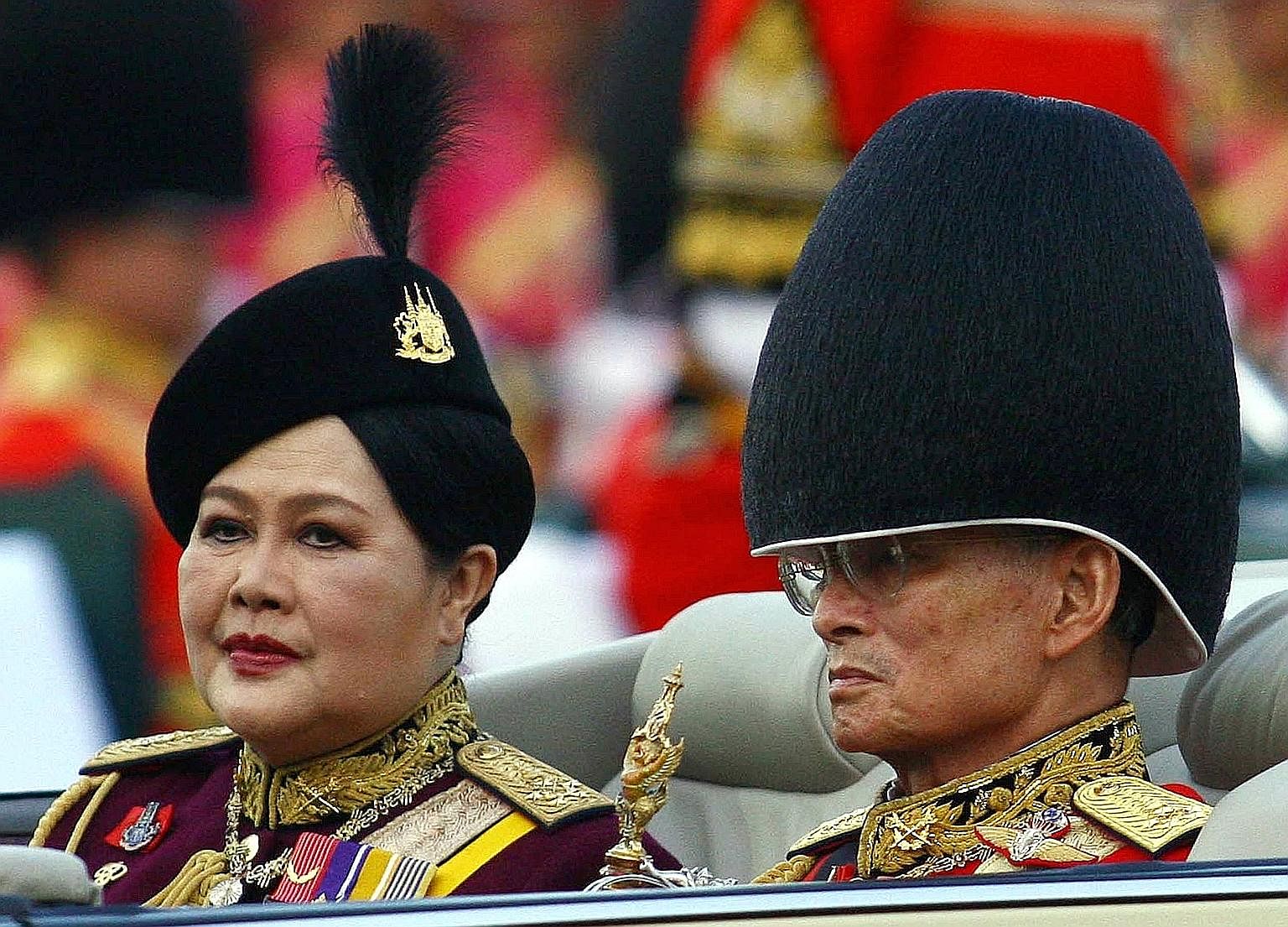 King Bhumibol Adulyadej and Queen Sirikit at celebrations in Bangkok to mark his 79th birthday in 2006. For the majority of Thais who have known only one monarch amid decades of political turbulence, the King's death represents the loss of a moral au