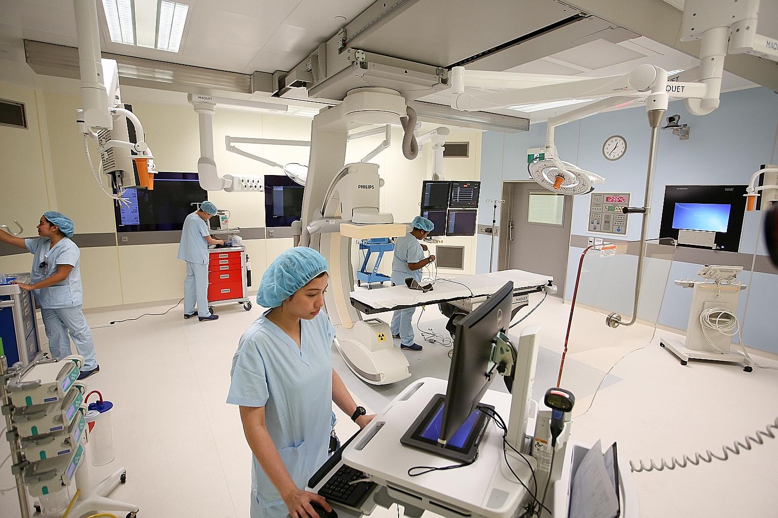 An operating theatre at Farrer Park Hospital. Premiums for private hospital plans could soon rise by 9 to 15 per cent.