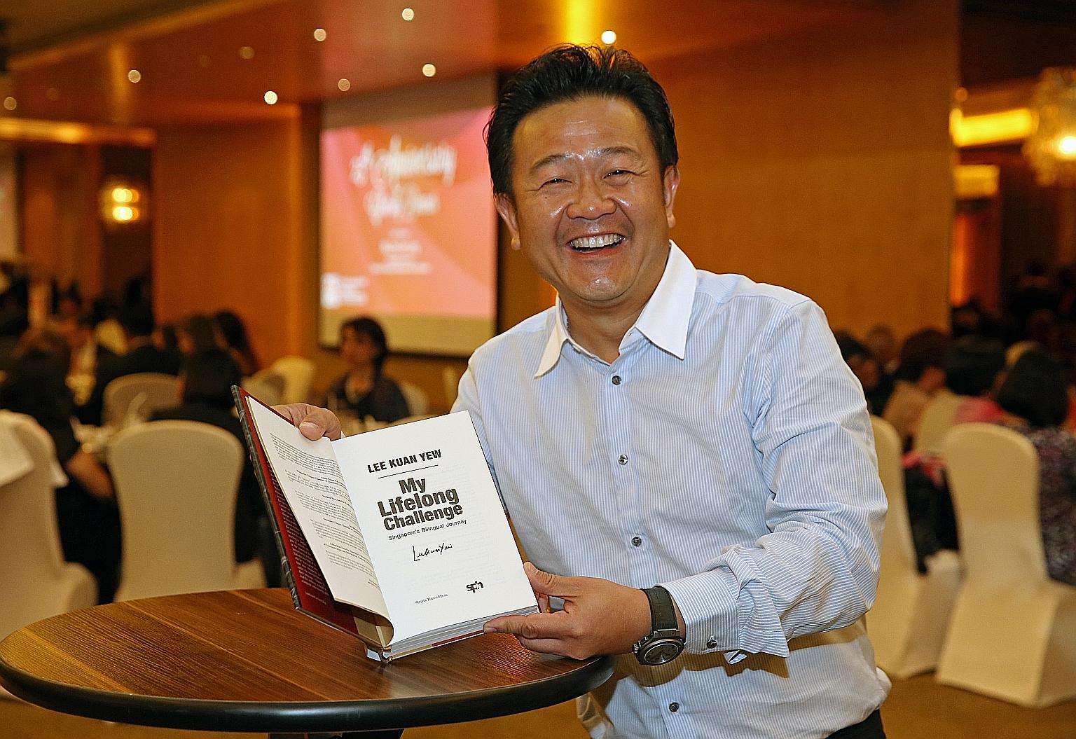 Mr Kwee's winning bid of $11,000 got him a signed copy of Mr Lee Kuan Yew's book My Lifelong Challenge at yesterday's auction.