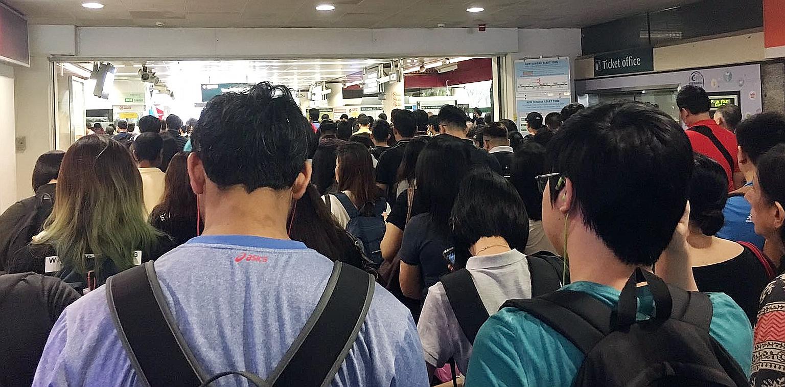 Commuters at Lakeside MRT station during the delay, which was reported at about 7am yesterday.