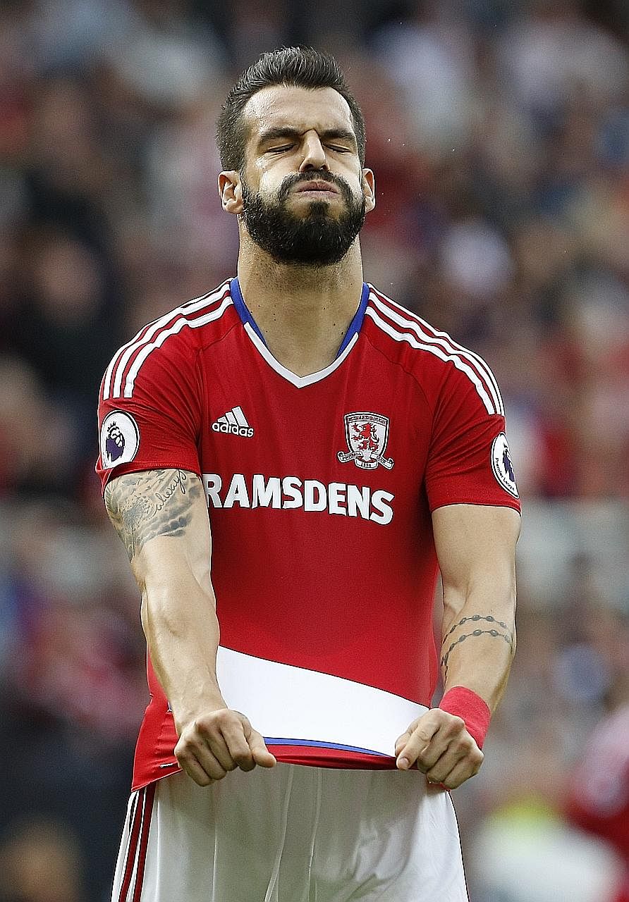 Middlesbrough's Alvaro Negredo, a former Manchester City striker, shows his frustration after missing a chance to score against Tottenham on Sept 24. After losing their past seven matches, the Teessiders are seeking their first away league win agains