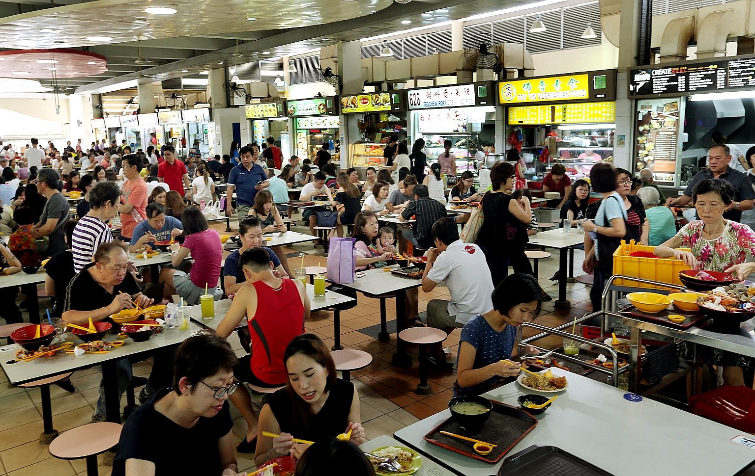 Market and food centre bustling again after blaze | The Straits Times
