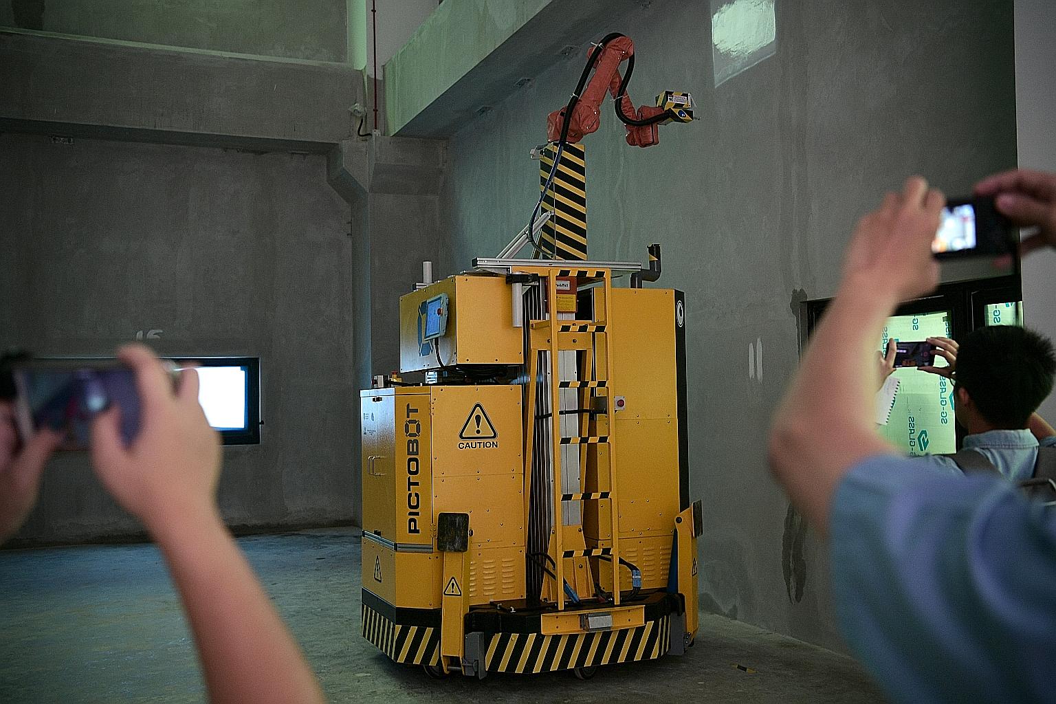 The PictoBot can spray-paint a 90 sq m wall within an hour, a task which currently takes two workers more than 90 minutes to complete.