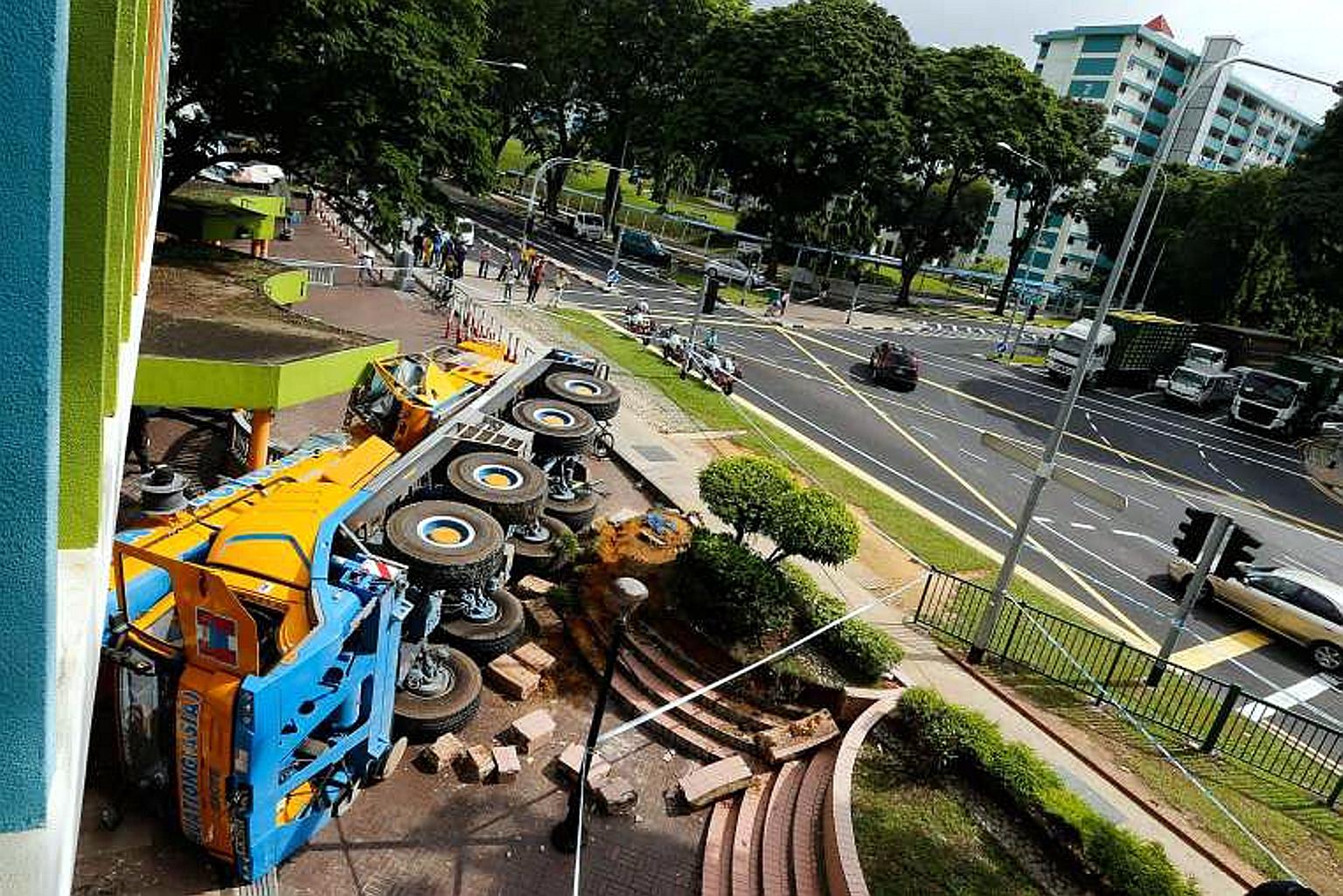 This mobile crane crashed into a POSB branch in Woodlands in February after the driver lost control of the vehicle.