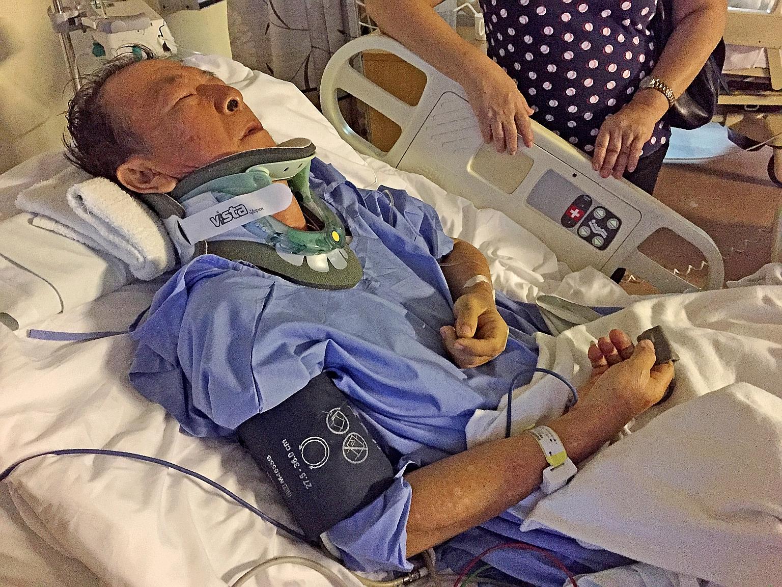 Mr Loy Chee Bin being treated at SGH last month.