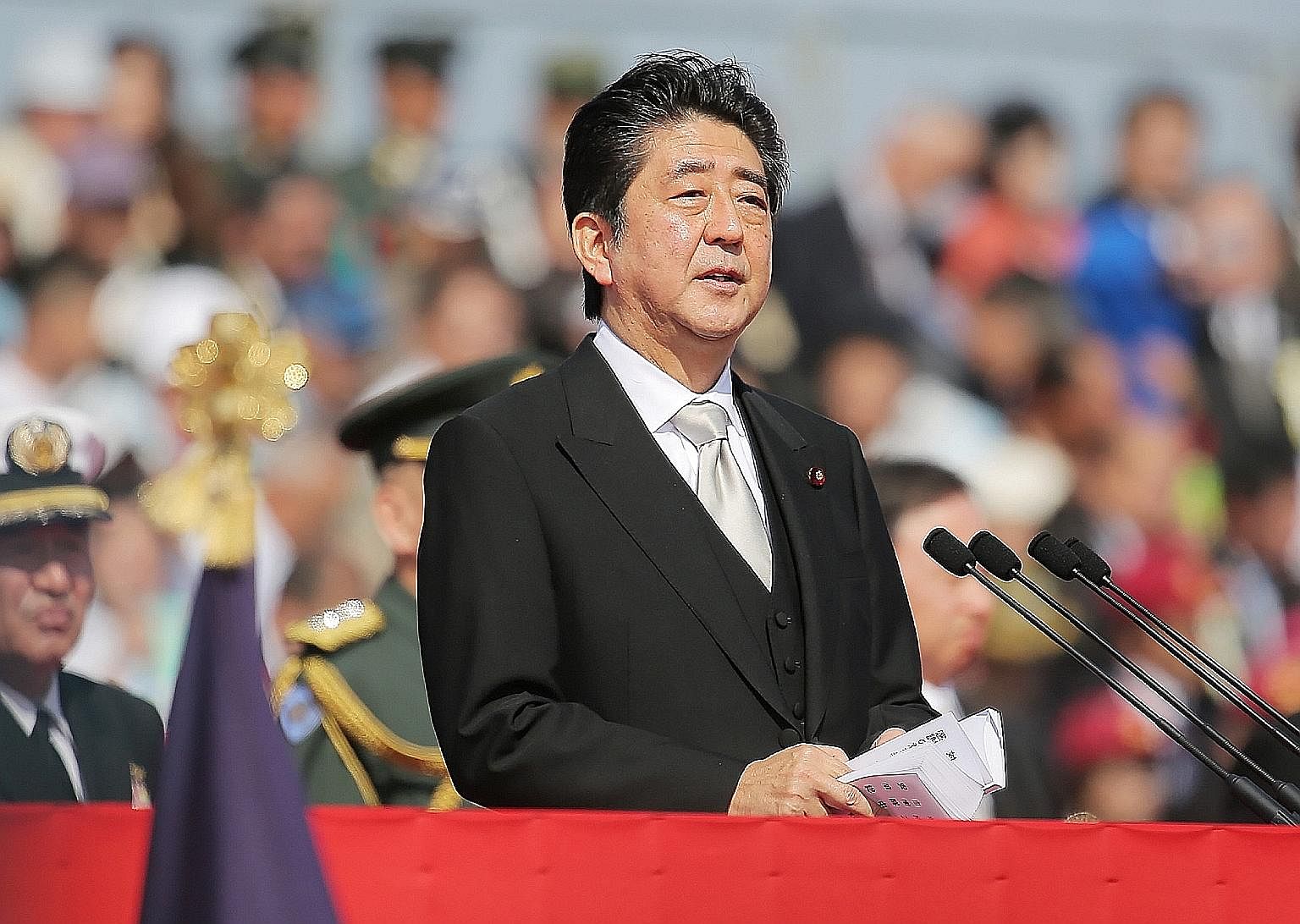 Mr Abe was due to step down as LDP president in September 2018 if not for the rule change - which must be formally approved at a party convention next March.