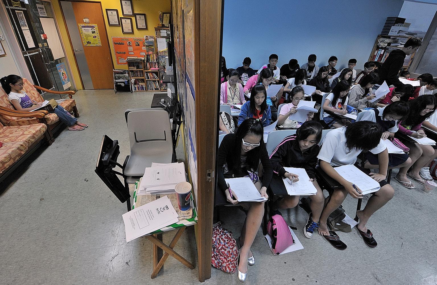 One parent says extra coaching, sometimes through tuition, helped her child cope with more complex topics and catch up in class.