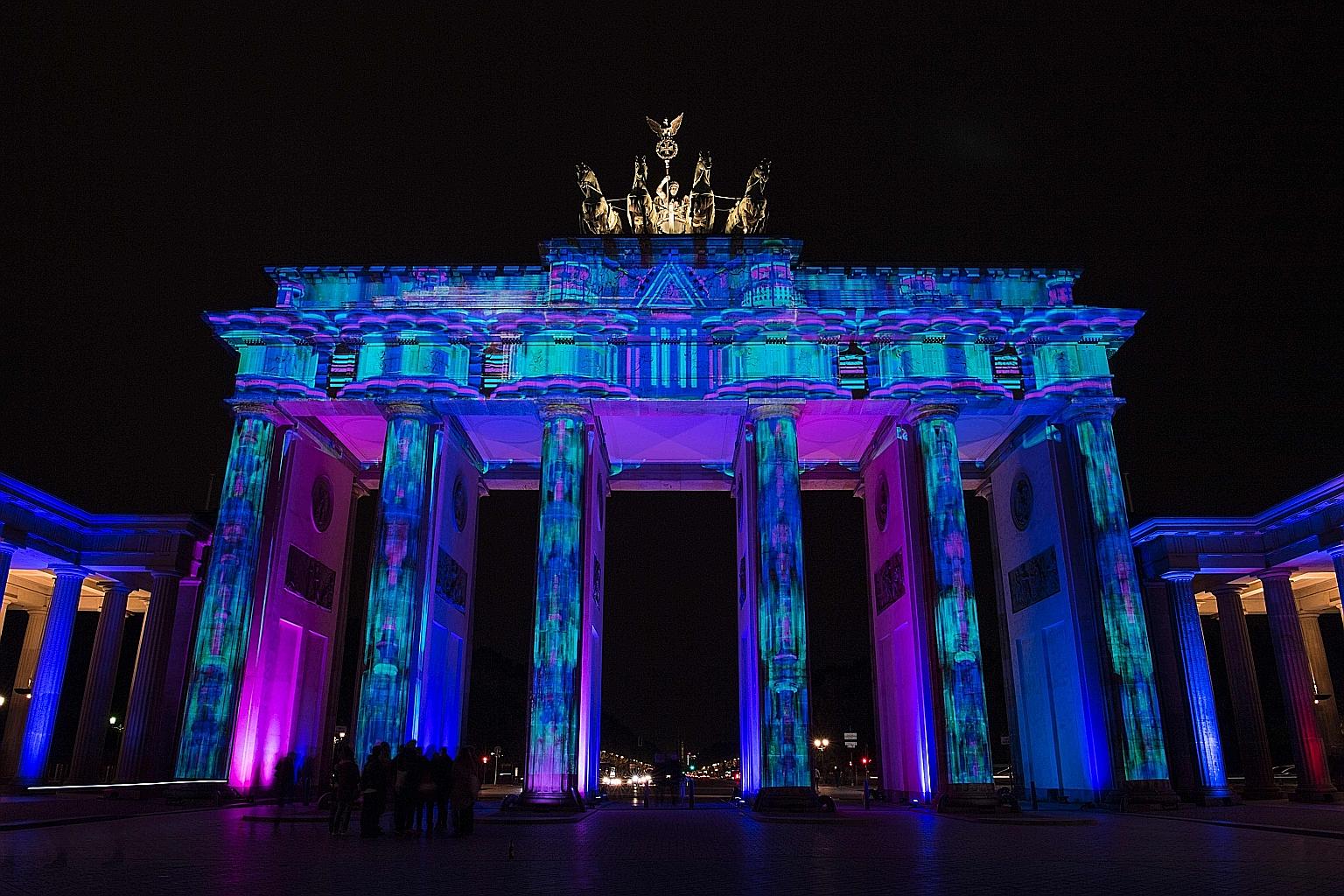 The Brandenburg Gate lit up during the Festival of Lights earlier this month. Berlin's vibrant scene is a draw for tech start-ups.
