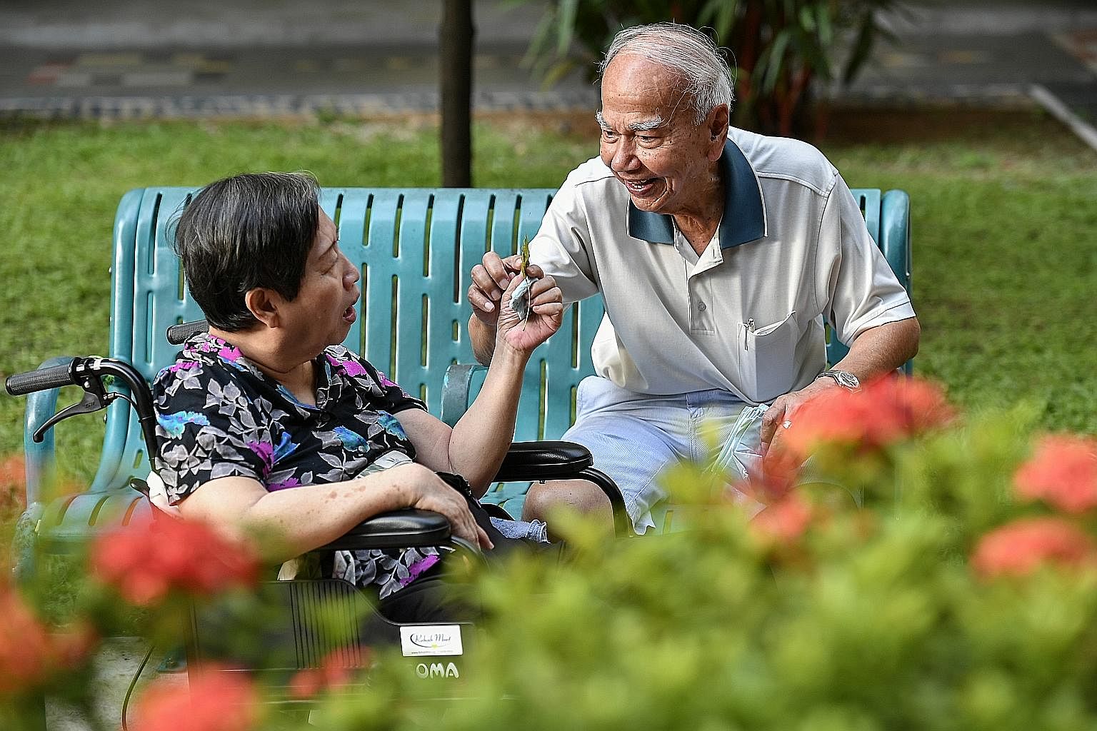 Mr Wong takes Madam Pang out in her wheelchair every morning. An active member of the Colon Cancer Patient Support Group, he also mans a hotline and counsels newly diagnosed colon cancer patients.