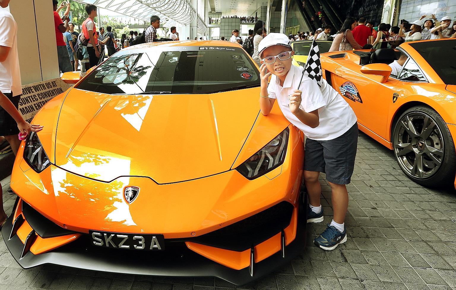 Nine-year-old Javier, along with 29 other beneficiaries, got a 30-minute tour of Marina Bay and Orchard Road in a Lamborghini.