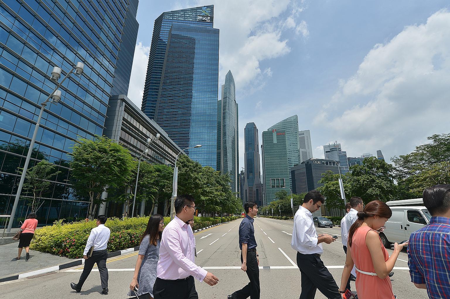Singapore's central business district. Among the questions and points that MPs put to Manpower Minister Lim Swee Say yesterday was one suggesting that MOM work closely with unions and bosses to reduce the number of job mismatches. Mr Lim agreed, sayi
