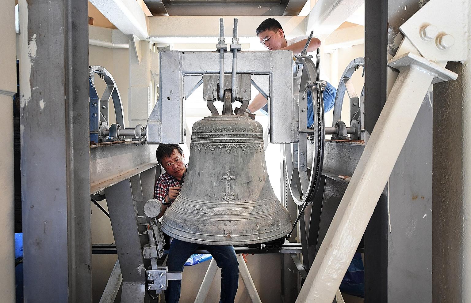 The cathedral's crucifix has been hung in its original position and the marble altar put up. Back in place also are the semi-circular stained glass panels above the doors, the chandeliers and the Stations of the Cross paintings. The cathedral also ha