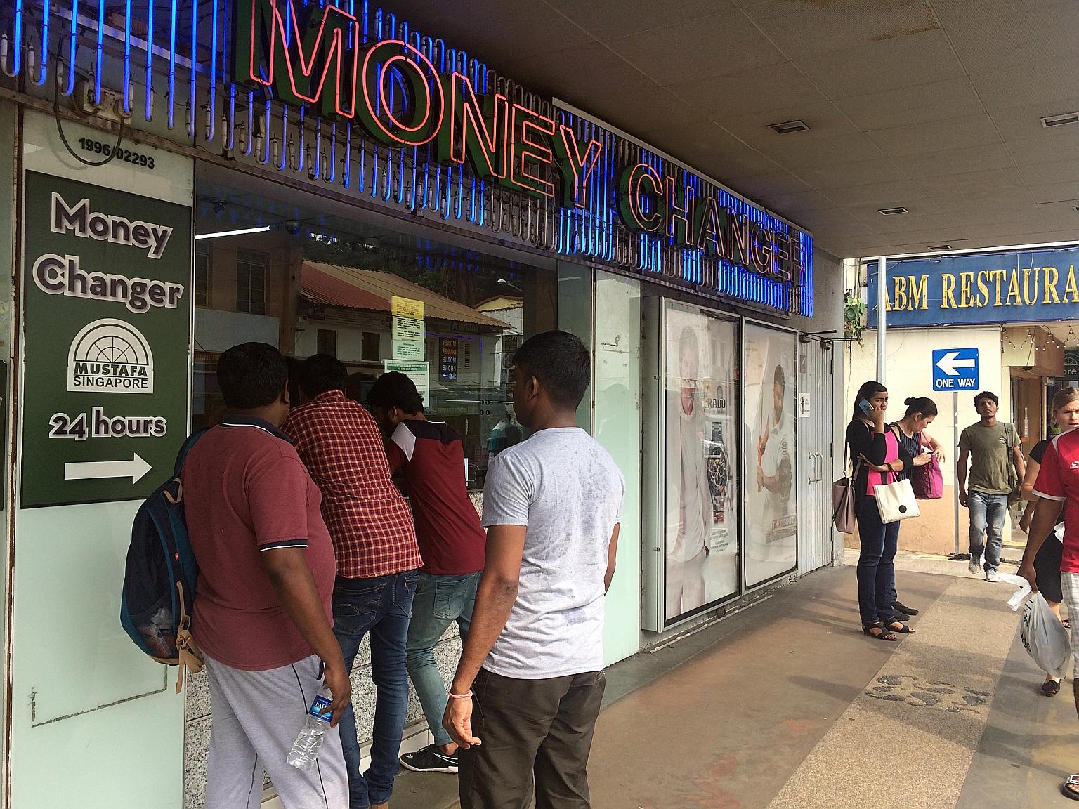 Money changers in Little India say more people have been approaching them to exchange the old 500 and 1,000 Indian rupees, which stopped being legal tender on Tuesday.