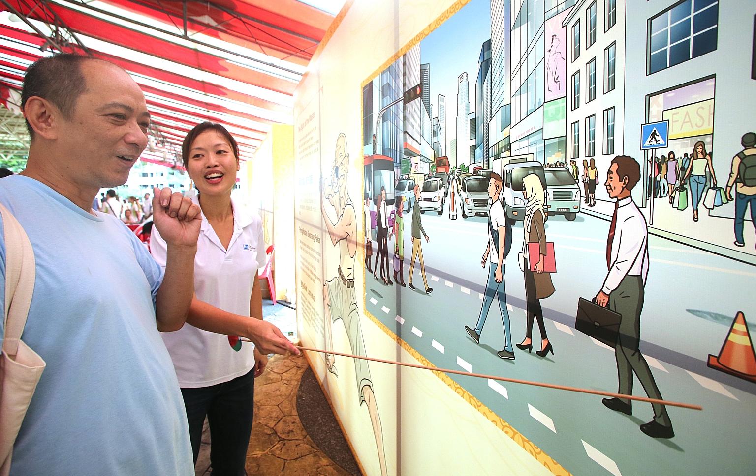 The Traffic Police distributed test kits to 1,000 residents at the Bedok Community for All Ages day yesterday. The kit allows seniors to test their sight and reflexes.