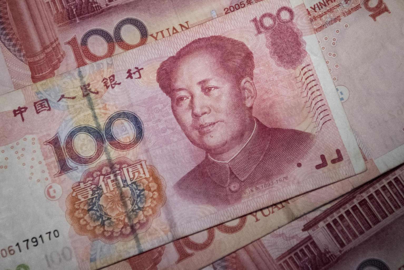 China weakens yuan to 8-year low as US dollar surges | The Straits Times
