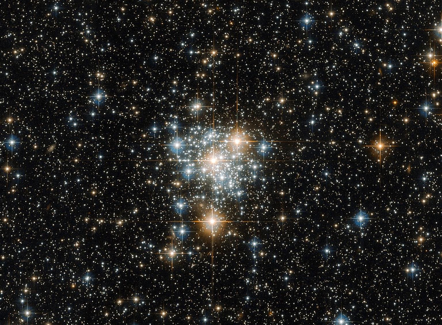 This is an image of NGC 299, an open star cluster located within the Small Magellanic Cloud, just under 200,000 light years away. According to the European Space Agency, an open cluster such as this is a collection of stars weakly bound by the shackl