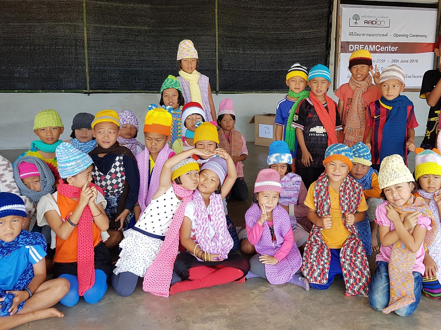 Members of Facebook group Yarns Spree made over 2,500 beanies, scarves, mittens and booties for underprivileged children in northern Thailand for charity Radion International's donation drive.