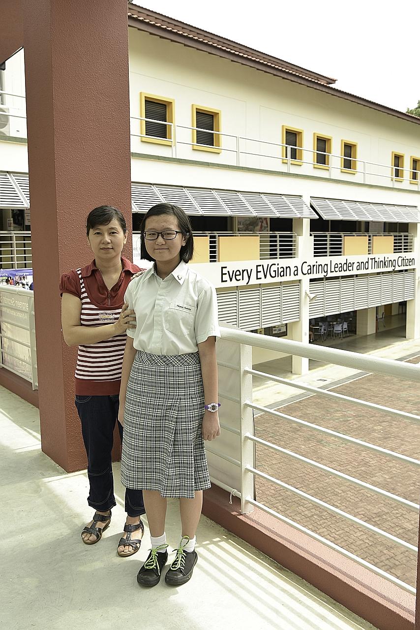 Wei Ling, with her mother, Madam Lau, likes the environment at Evergreen Secondary School. The Secondary 1 student finds the teachers caring too.