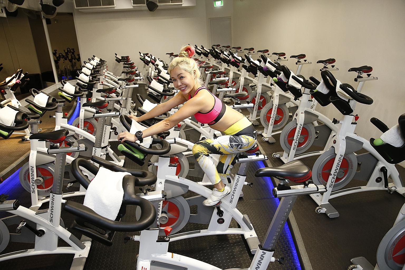 Ms Lee balances her love of food with a variety of exercise routines, including indoor cycling, to keep herself motivated.