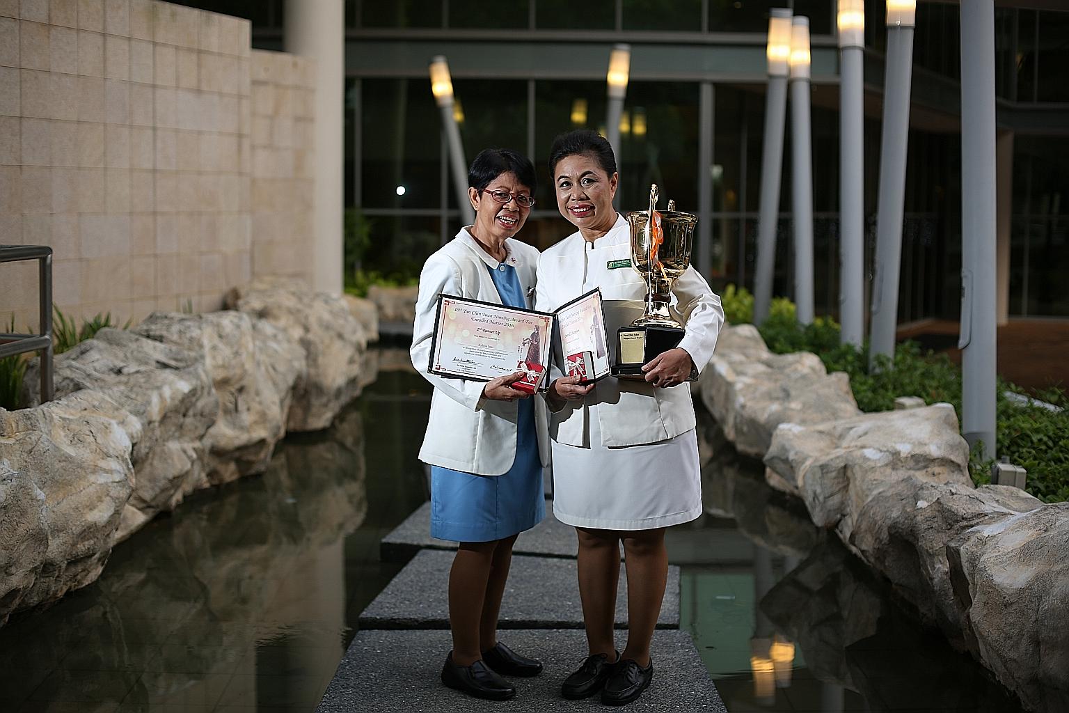 Ms Sylvia Jani (at left), an enrolled nurse at Kwong Wai Shiu Hospital, won the third prize of the Tan Chin Tuan Nursing Award while Ms Nasah Sohor (right), a principal enrolled nurse at Singapore General Hospital (SGH), came in first. She also won t