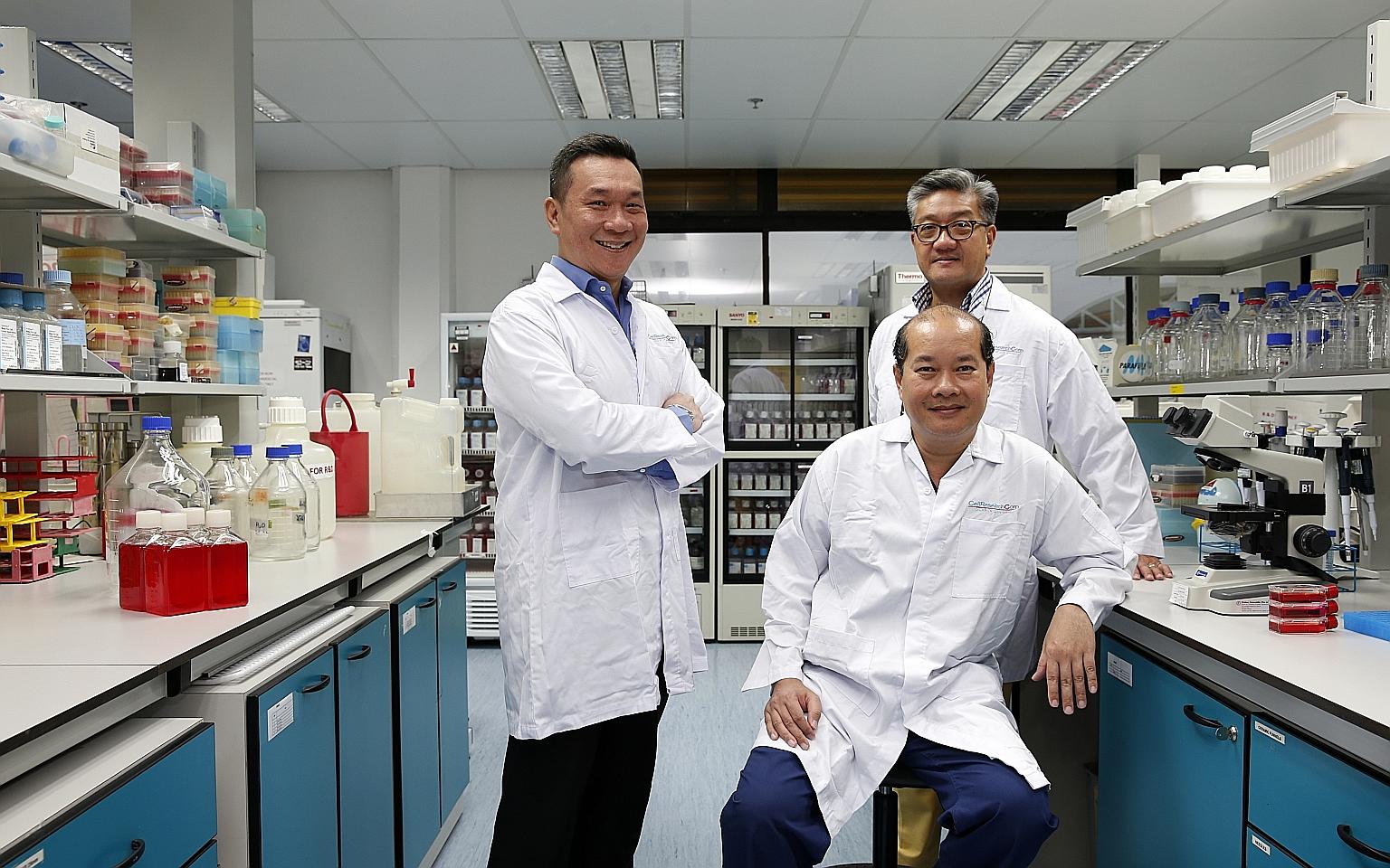 CellResearch - founded by (standing from left) group chief medical officer Ivor Lim, group chief executive Gavin Tan and group chief scientific officer Phan Toan Thang (sitting) - is now worth $700 million and has 39 patents worldwide.