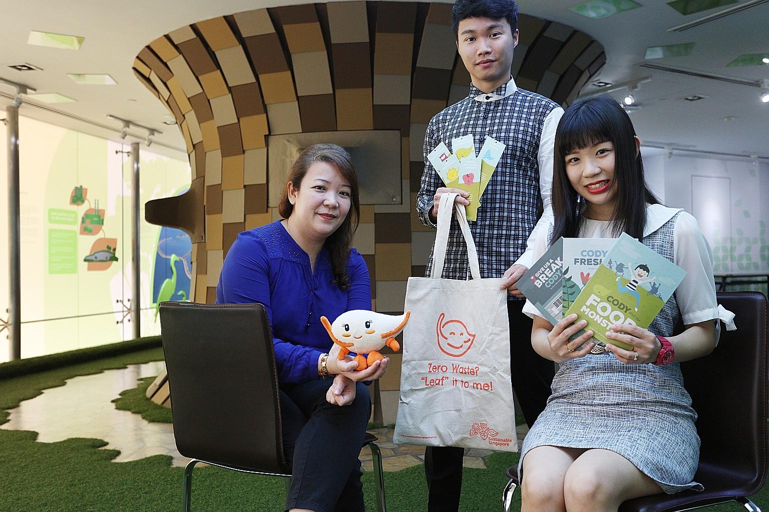(From left) Ms Chua, Mr Kong and Ms Leow of MEWR's marketing communications team. The team came up with cartoon mascots and books to boost awareness of the Sustainable Singapore Blueprint.