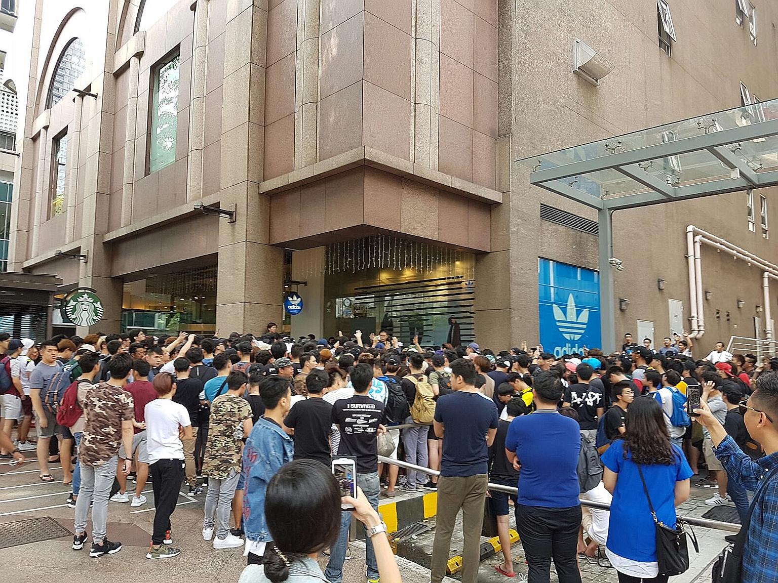 Hundreds of customers were crowded around the Adidas Originals Pacific Plaza store at about 10am yesterday. Some had been waiting outside the store for two nights since Thursday for the shoes, which cost $229.