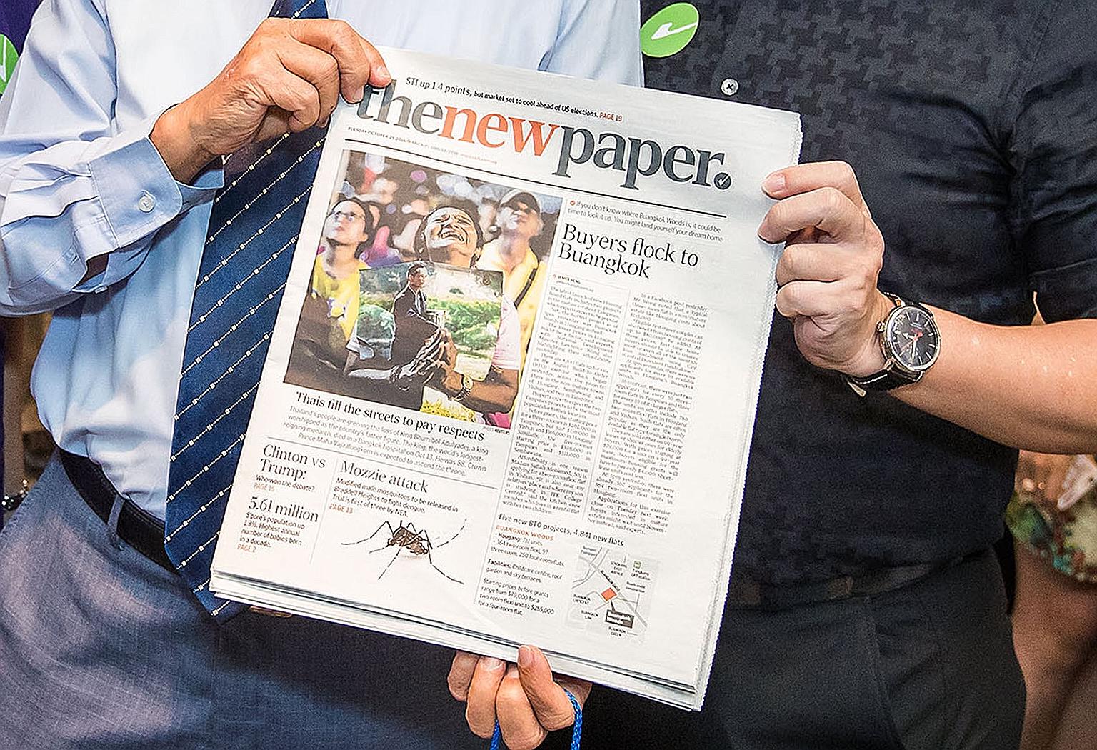 The redesigned paper at its trade launch on Oct 25. The New Paper will cater to professionals, managers, executives and businessmen, but will continue to have stories that inspire and touch readers, said Mr Eugene Wee, who takes over as editor on Thu