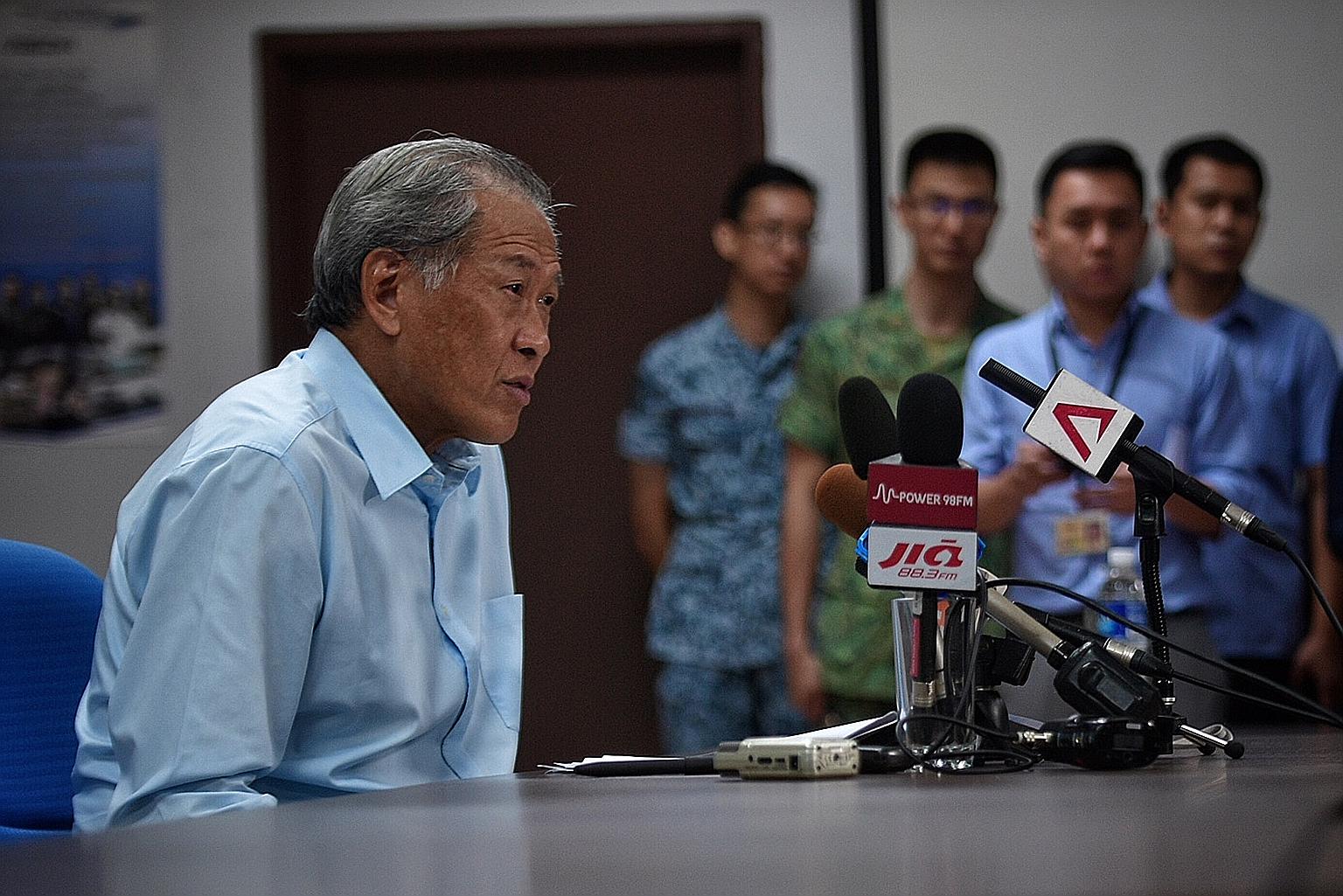 Dr Ng speaking to reporters during his visit to Choa Chu Kang military camp yesterday. Addressing the issue of the detention of SAF armoured vehicles in Hong Kong, he said the vehicles did not contain any controlled military items that would require