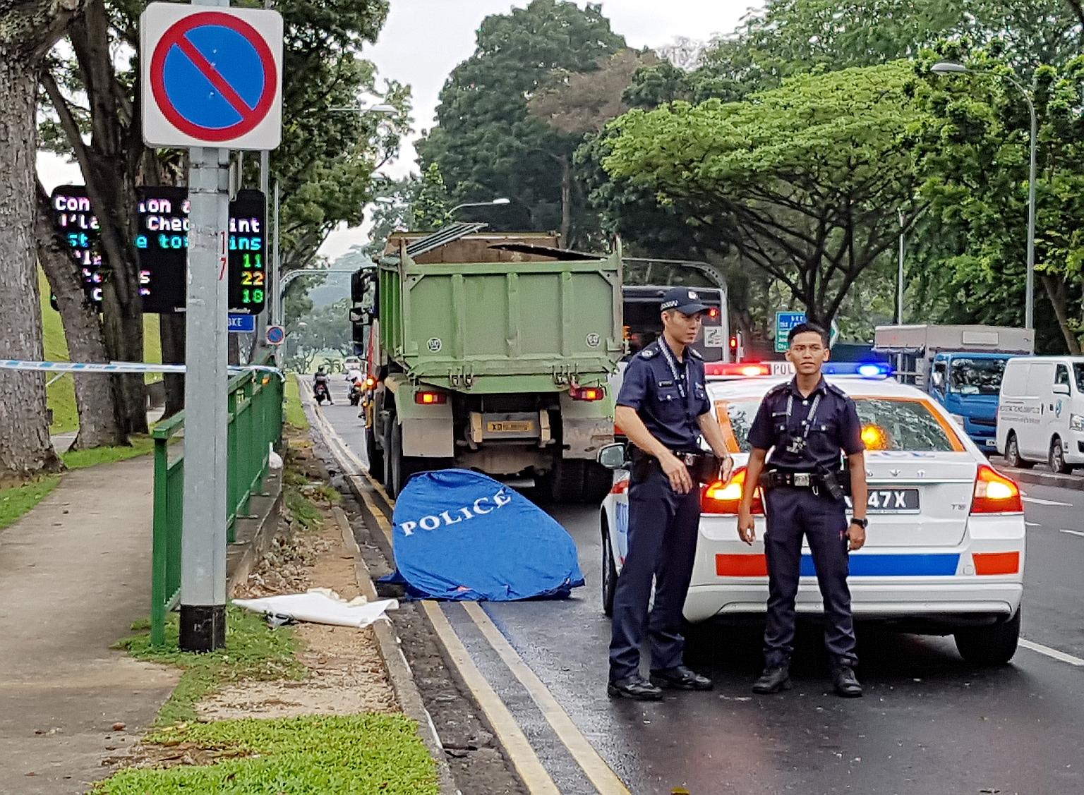 Police were alerted to the accident in Woodlands Centre Road yesterday at 5.58am. The motorcyclist was pronounced dead at the scene and the tipper truck driver was arrested for causing death by a negligent act.