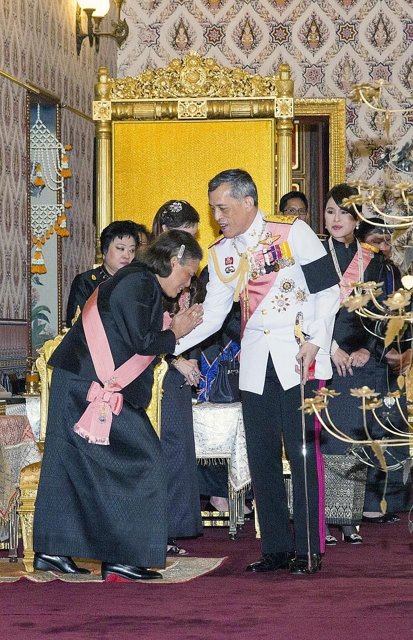 Then Crown Prince Maha Vajiralongkorn being greeted by his younger sister, Princess Maha Chakri Sirindhorn, at a royal funeral ceremony for the late Thai King Bhumibol at the Grand Palace in Bangkok on Thursday.
