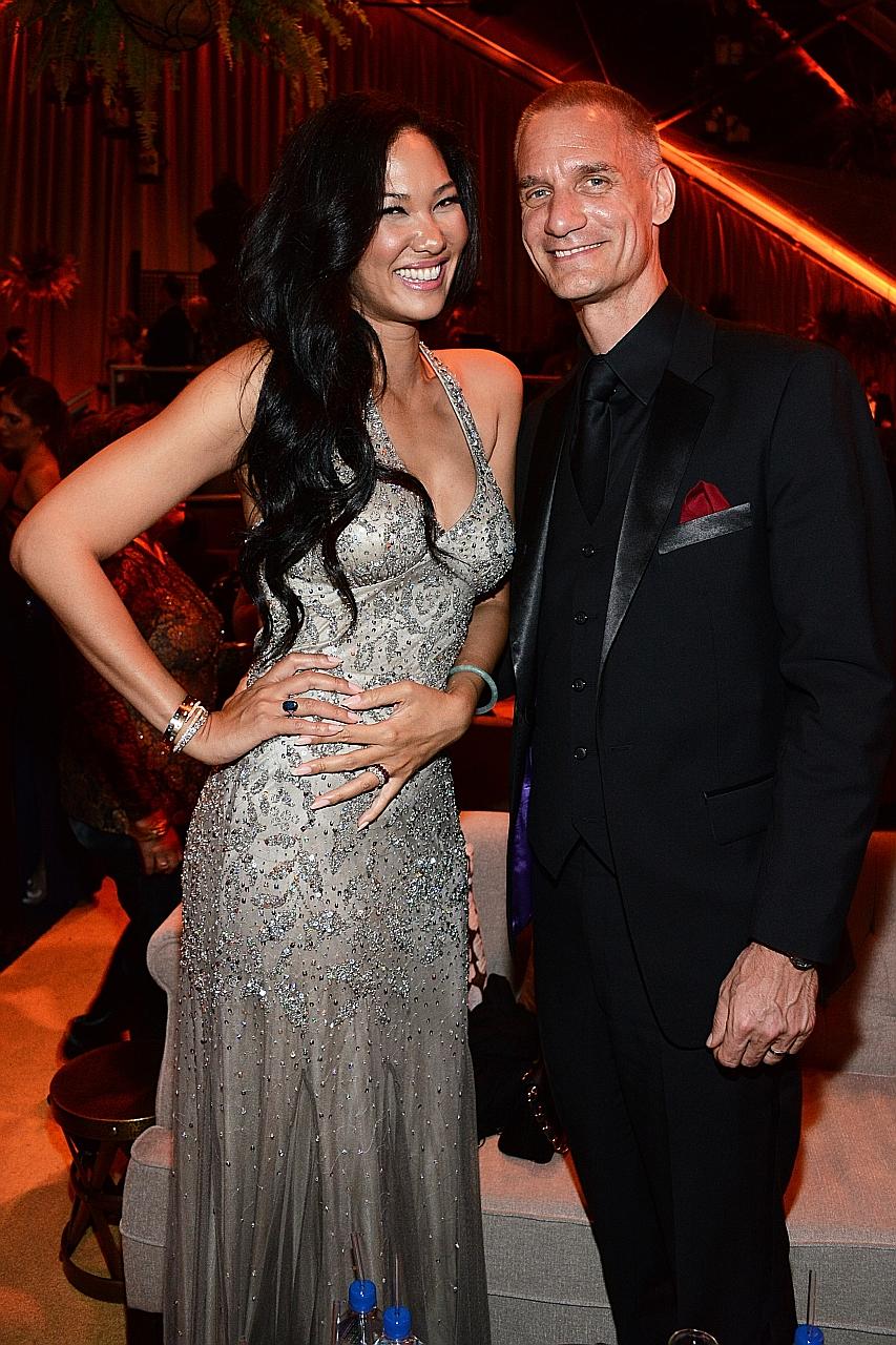 Mr Leissner and his wife, model Kimora Lee Simmons, at a Golden Globes party in 2014. After the 1MDB scandal broke, Goldman found that he allegedly violated company policies.