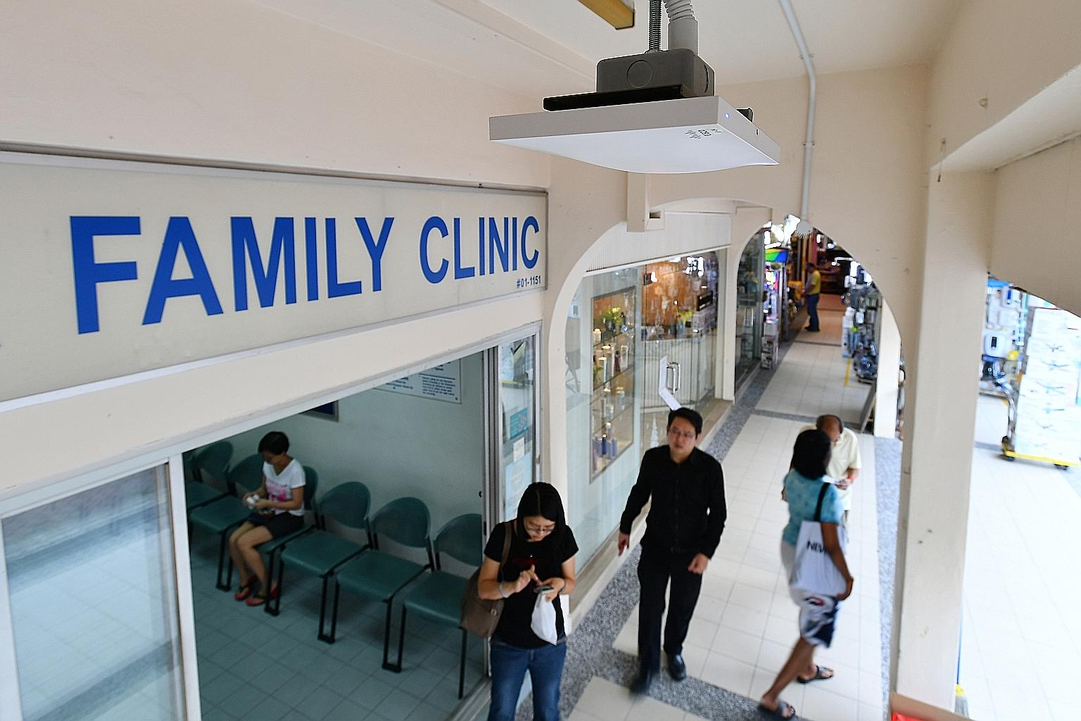 A Wi-Fi access point - the white box mounted on the ceiling - in Tampines Street 21. A mobile app to make online purchases from shops in the area, and book appointments at places like the neighbourhood dental clinic or beauty salon, is in the pipelin