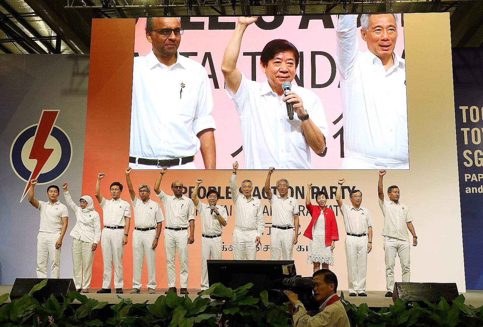 PM Lee with fellow CEC members (from left) Social and Family Development Minister Tan Chuan-Jin; Speaker of Parliament Halimah Yacob; Minister in the Prime Minister's Office Chan Chun Sing; Communications and Information Minister Yaacob Ibrahim; Depu
