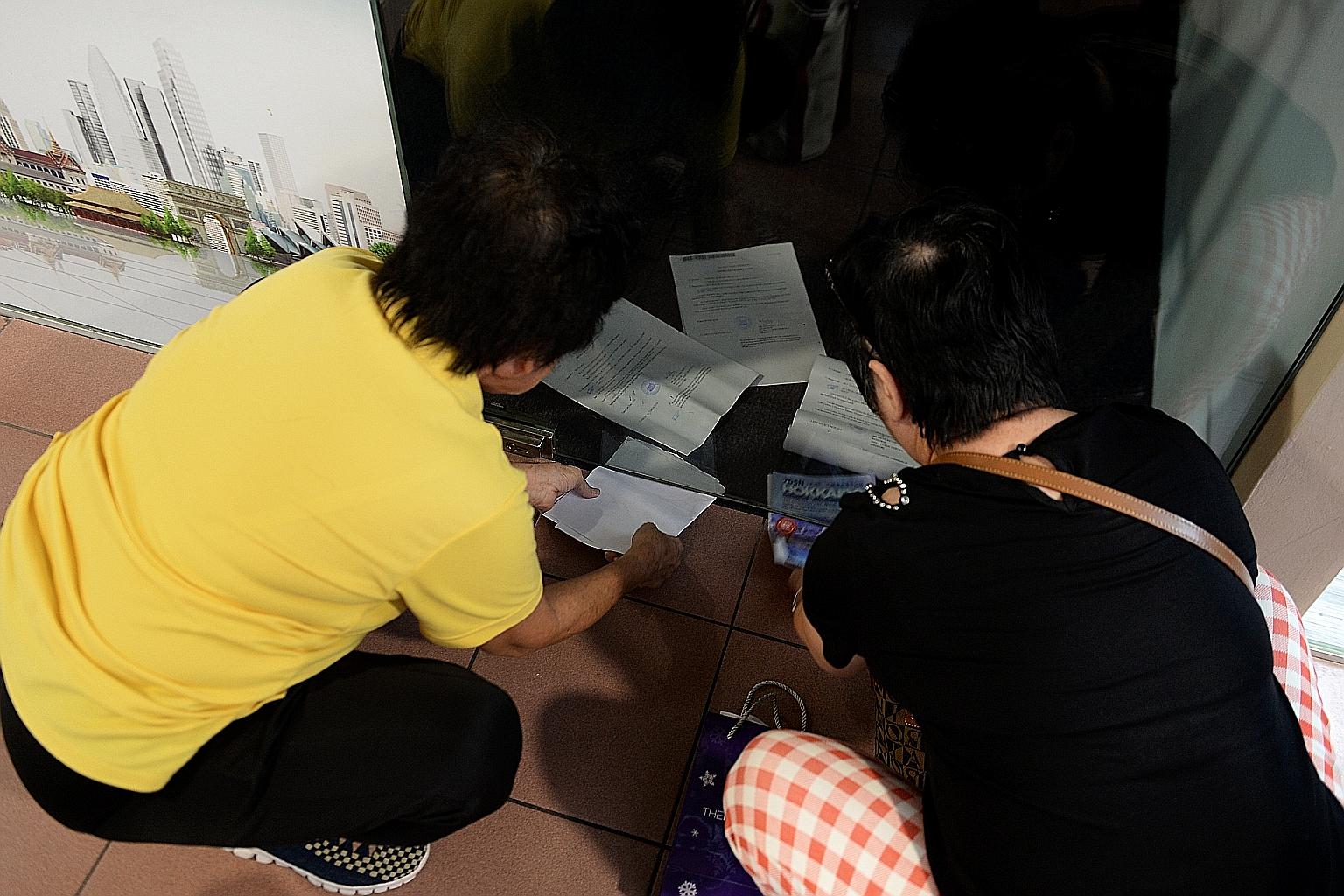 Madam Teo (in yellow shirt) and her friend had paid for their tour and got their itineraries. But hours before the flight, she allegedly received a text message saying the agency had closed.