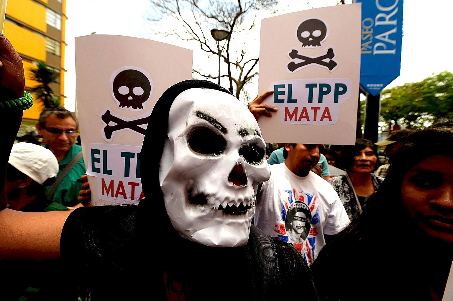 Protesters rally against the Trans-Pacific Partnership on the sidelines of the Apec Summit in Lima last month. Asia-Pacific leaders were urged to defend free trade from rising protectionism after Mr Donald Trump clinched the US presidency on a platfo
