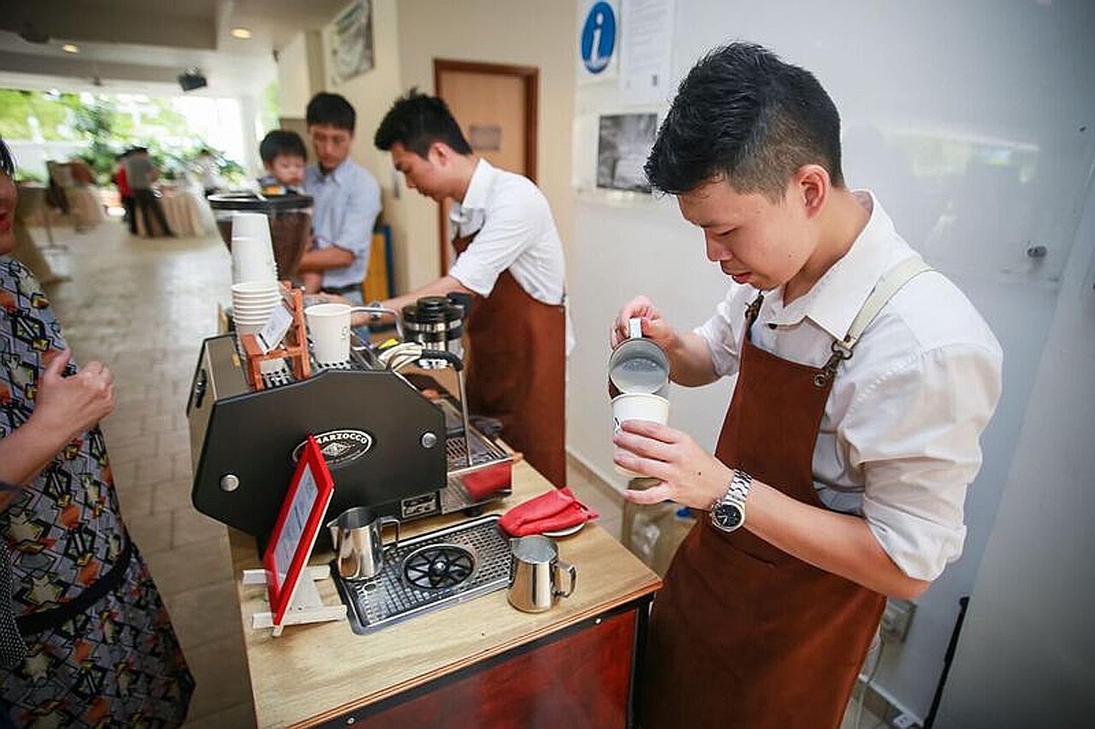 Olla Specialty Coffee owner Mr Lee (right) and barista Mike Ang serving coffee from a cart at a wedding in 2014. The coffee cart business here has grown, from just two to three companies in 2011 to about 20 now.