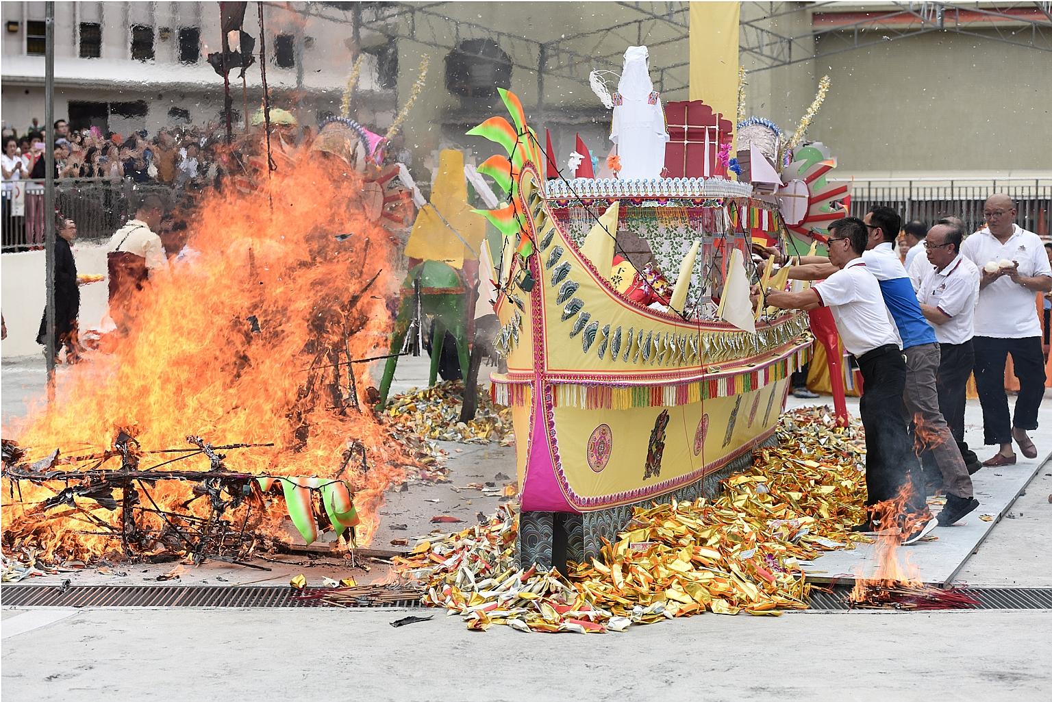 Two ships made of paper and carrying prayer tablets were burned at Kong Meng San Phor Kark See Monastery yesterday as part of the sending-off of the enlightened and holy beings. It marked the last of a seven-day Buddhist prayer ceremony known as the 