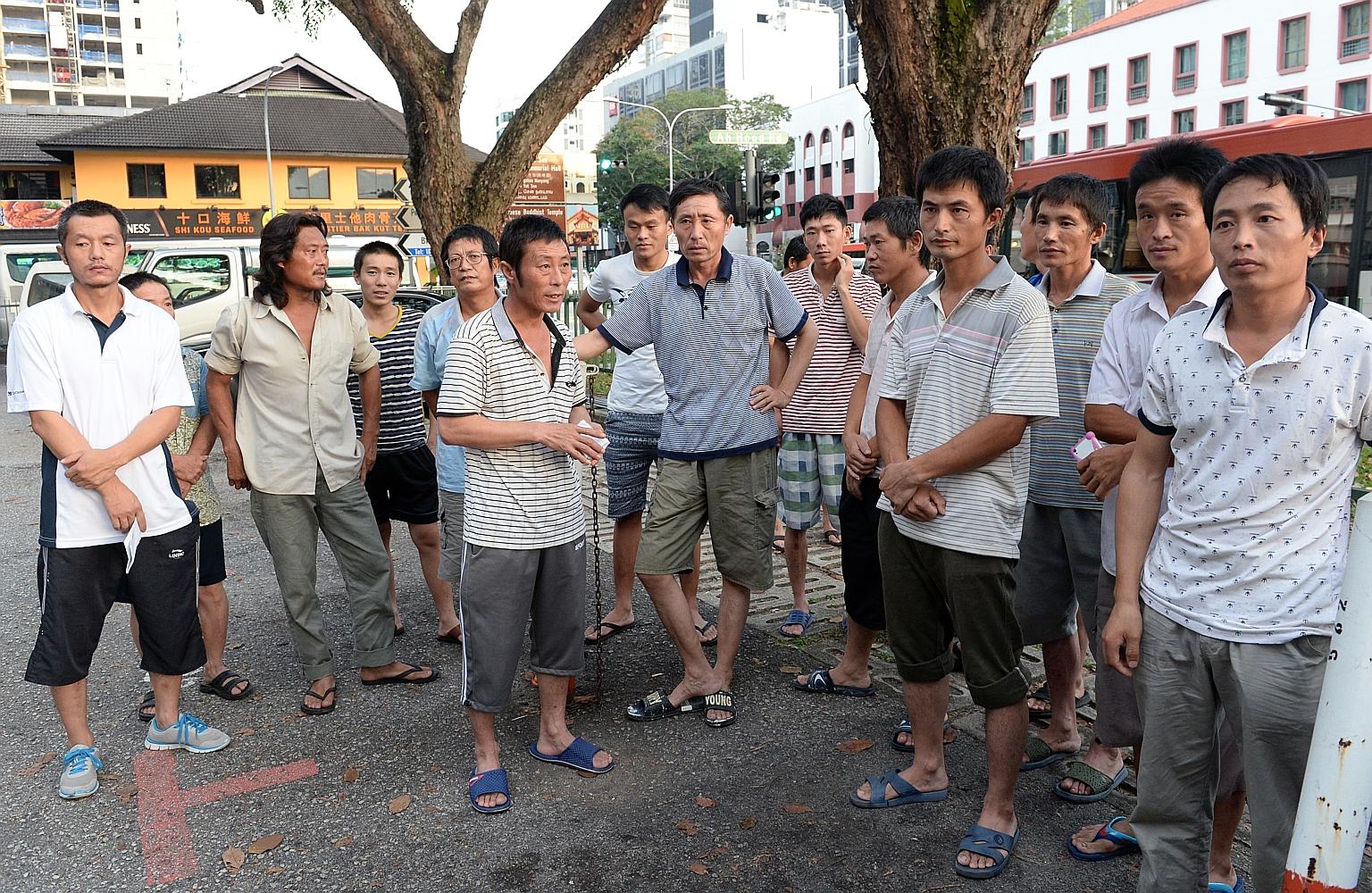 Some of the workers who claim they are owed money by subcontractor Audi Construction. As of last night, 19 of its workers from China had received part of the money owed to them and had flown home.