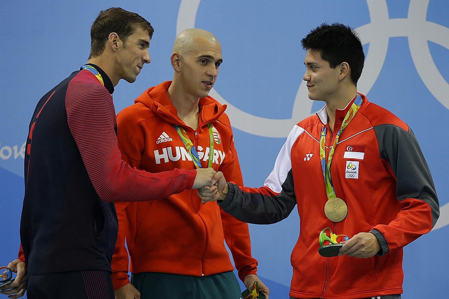 Joseph Schooling's Olympic triumph in the men's 100m butterfly race in August against swimming heavyweights Michael Phelps (left) and Laszlo Cseh was voted by readers as their favourite Singaporean moment of the year, with 50.2 per cent of the 1,336 