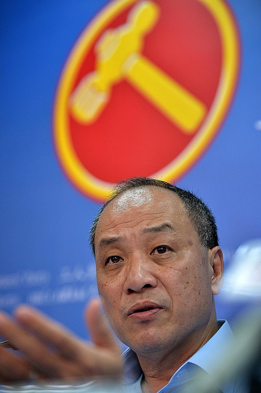 Workers' Party chief Low Thia Khiang (top) could face serious competition from Mr Chen Show Mao (above) at the party's next internal election.