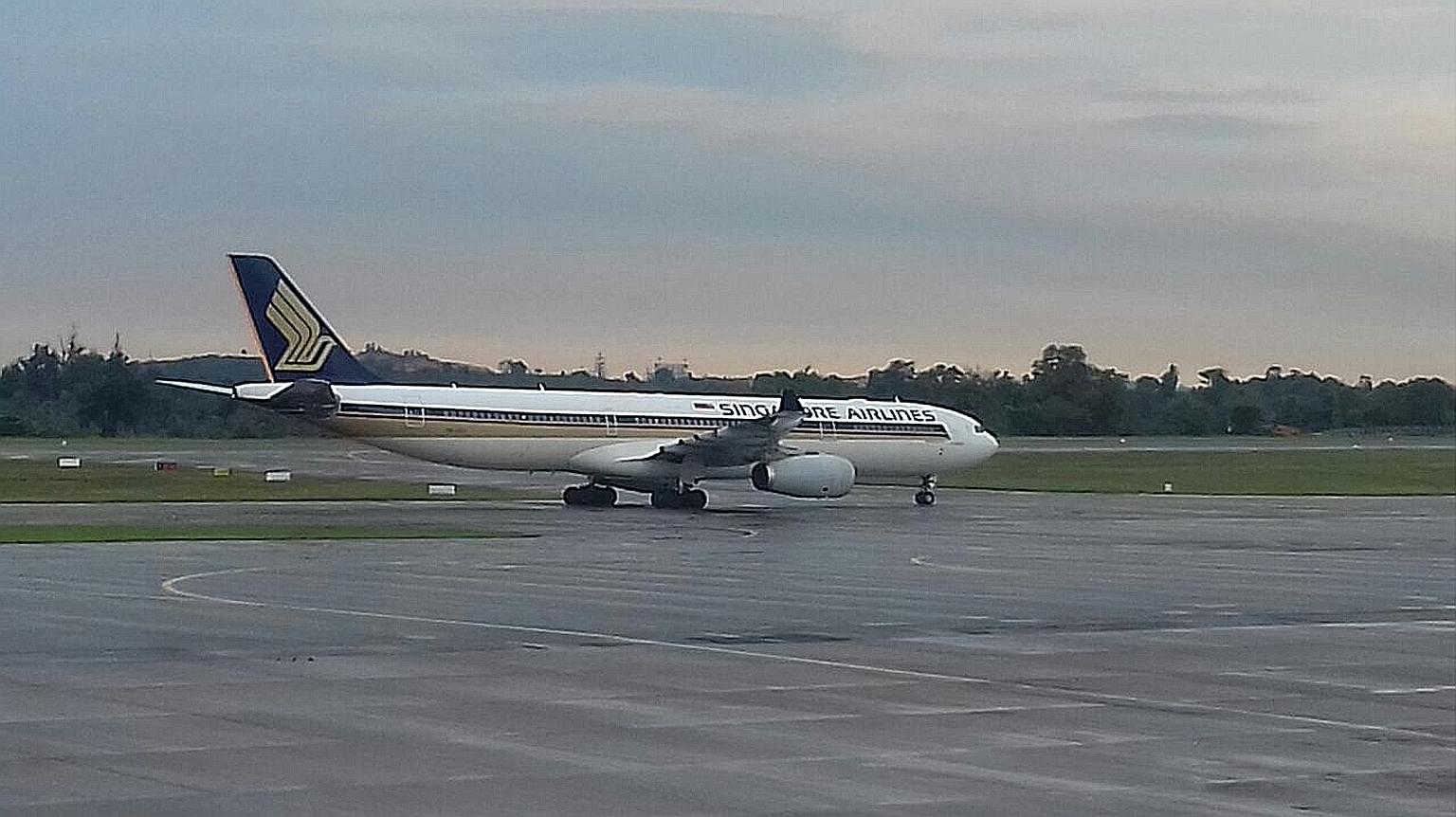 The SIA flight from Tokyo waited for three hours for a parking bay at the Batam airport. It eventually arrived at Changi airport five hours behind schedule.