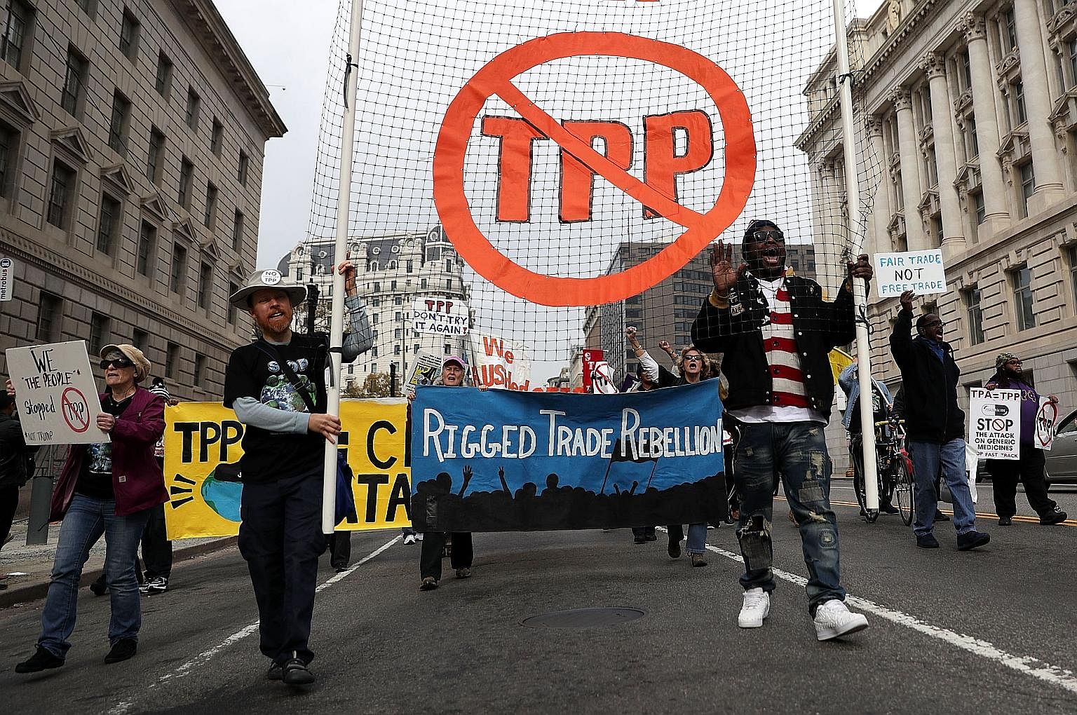 Protesters marching in an anti-TPP rally in Washington, DC last month.