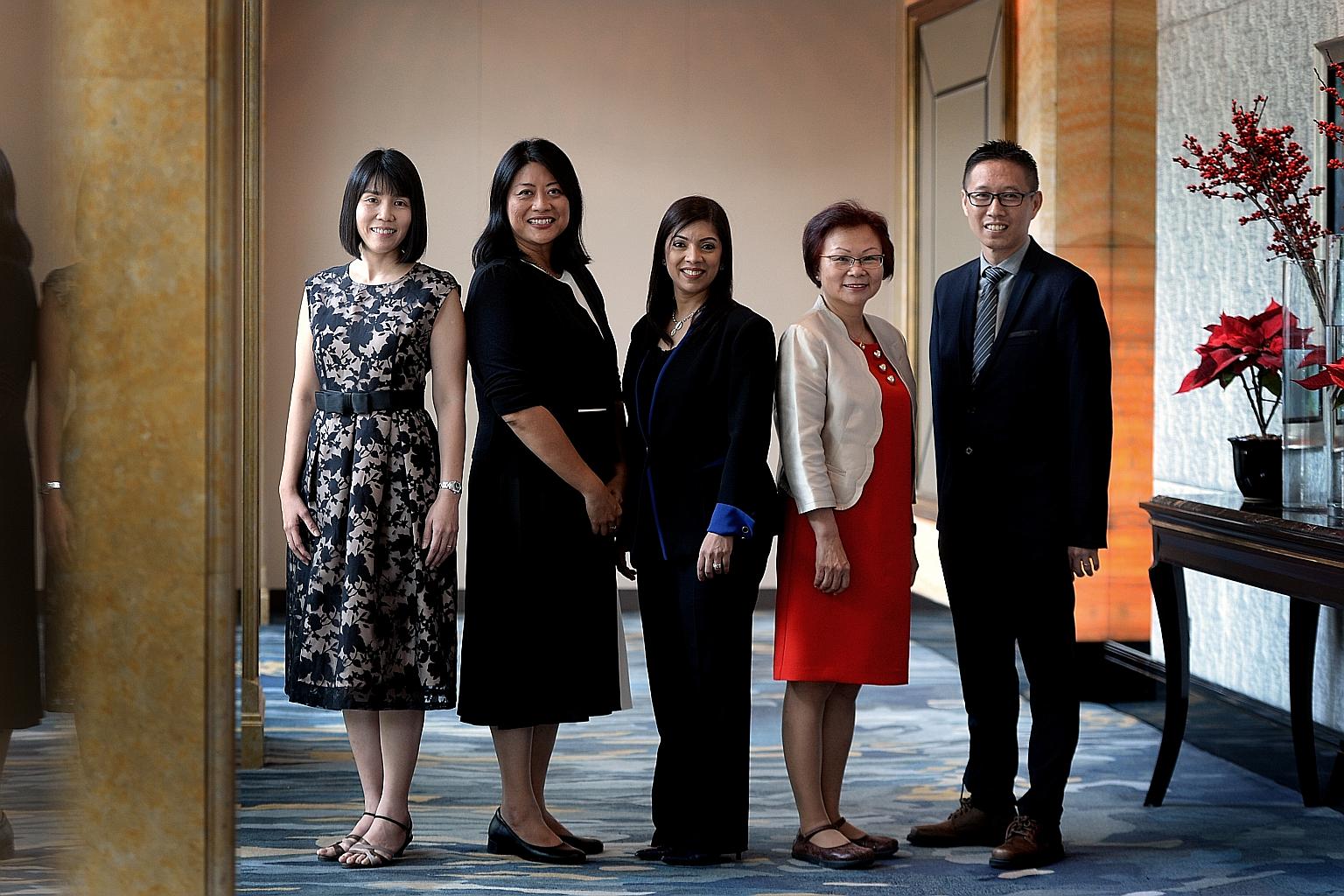 Among those who attended yesterday's event were (from left) Madam Allison Chong Ai Choo, newly appointed principal of Marymount Convent School; Ms Liza Rahmat, newly appointed principal of Meridian Primary School; Madam Rabiathul Bazriya Abubakar, in