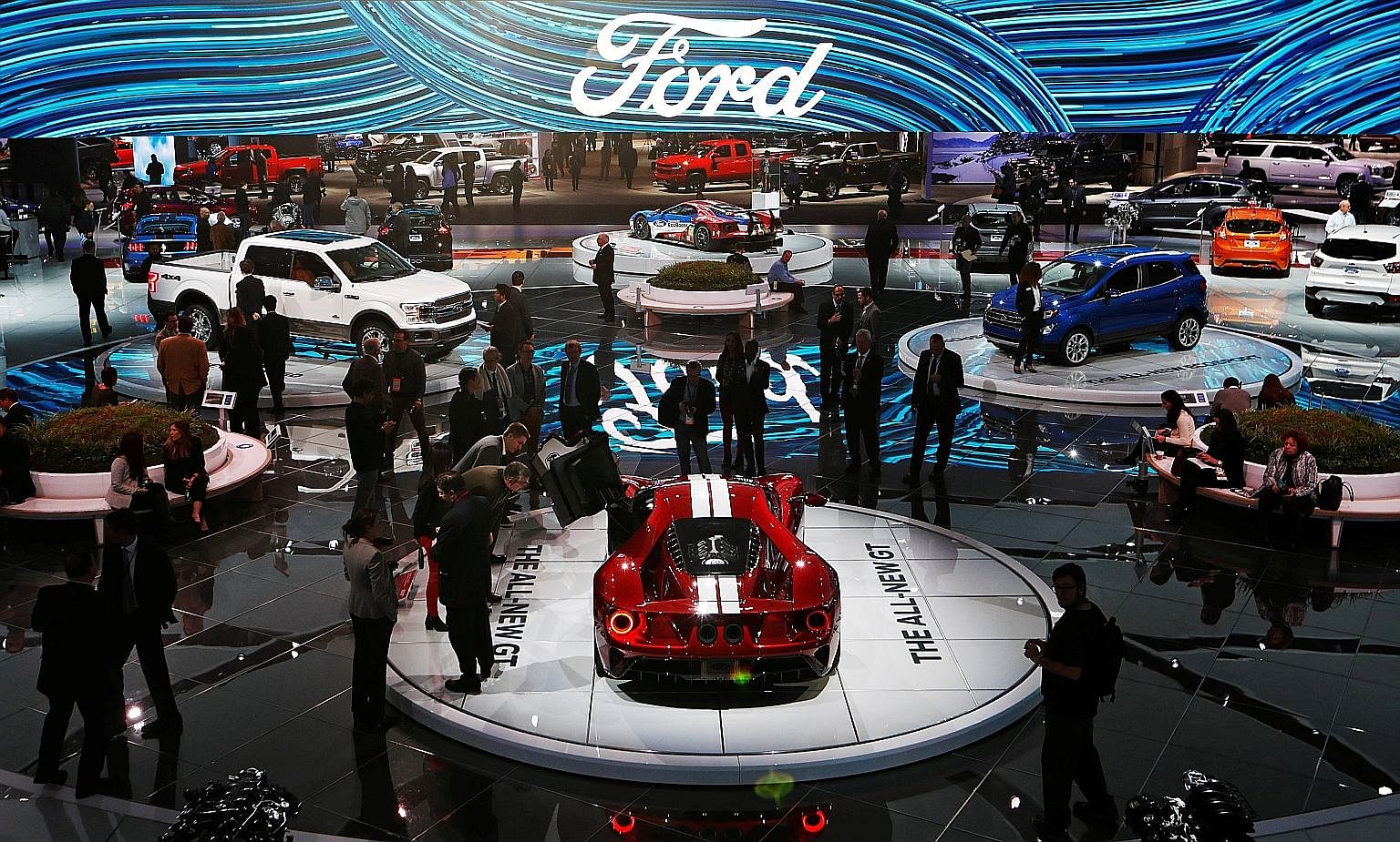 The Ford display at the North American International Auto Show in Detroit, Michigan, on Tuesday. The automaker's plan to invest $1 billion to build electric vehicles and create 700 jobs in Michigan is the latest sign that American companies expect th