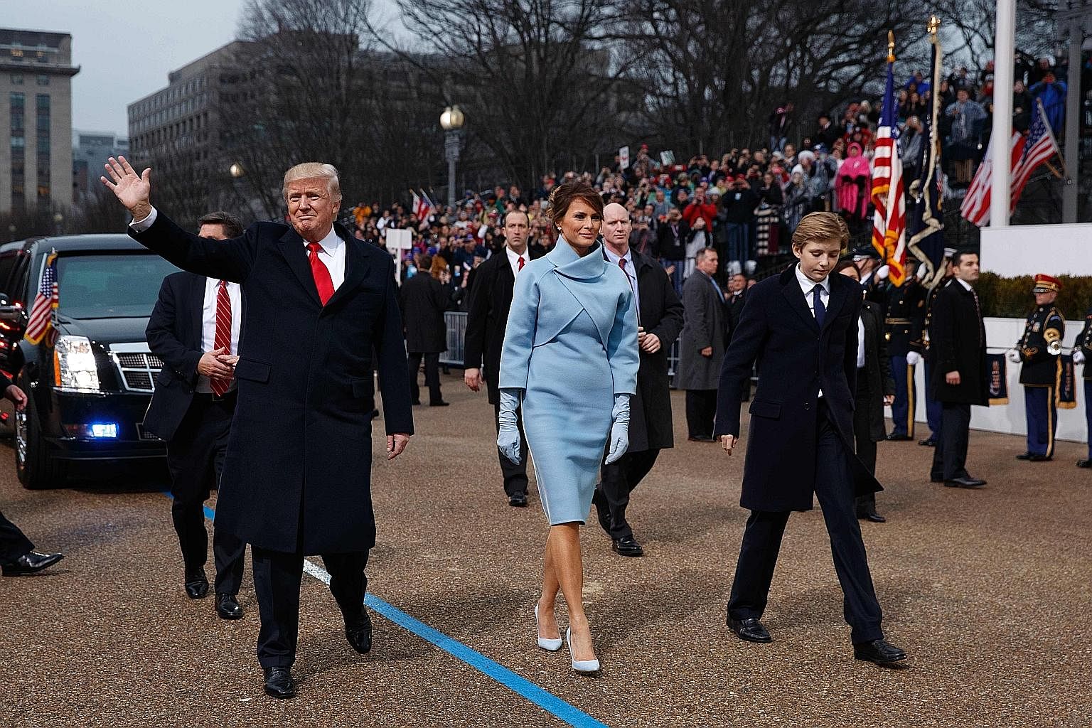 President Trump, his wife Melania and their son Barron during the inauguration parade in Washington last Friday. The writer says no one should underestimate Mr Trump, who published The Art Of The Deal in 1987, but MAGAlomania alone will not be enough