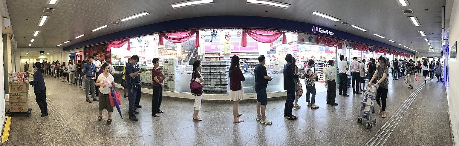 It is that time of the year again, when punters around the island try their luck at the annual Toto Hongbao Draw, worth $12 million this year. At the FairPrice outlet near Toa Payoh MRT station (above) at about 1pm yesterday, more than 80 people were