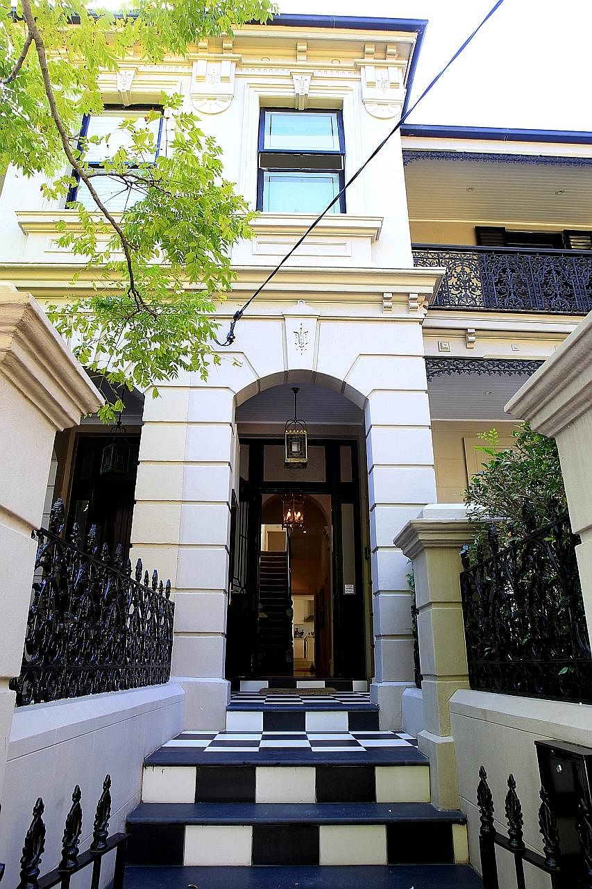 The entrance and interior of a two-storey, 2,658 sq ft property for sale in Woollahra in the upscale eastern suburbs of Sydney, which has seen home values rise 18 per cent in the past year amid an influx of foreign millionaires.